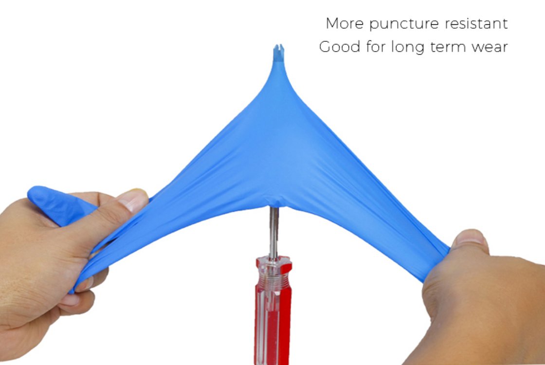 Puncture resistance test demonstrating nitrile glove durability against sharp objects